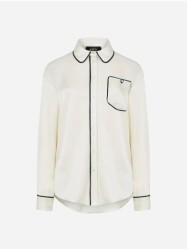 Plain blouse with contrasting fittings