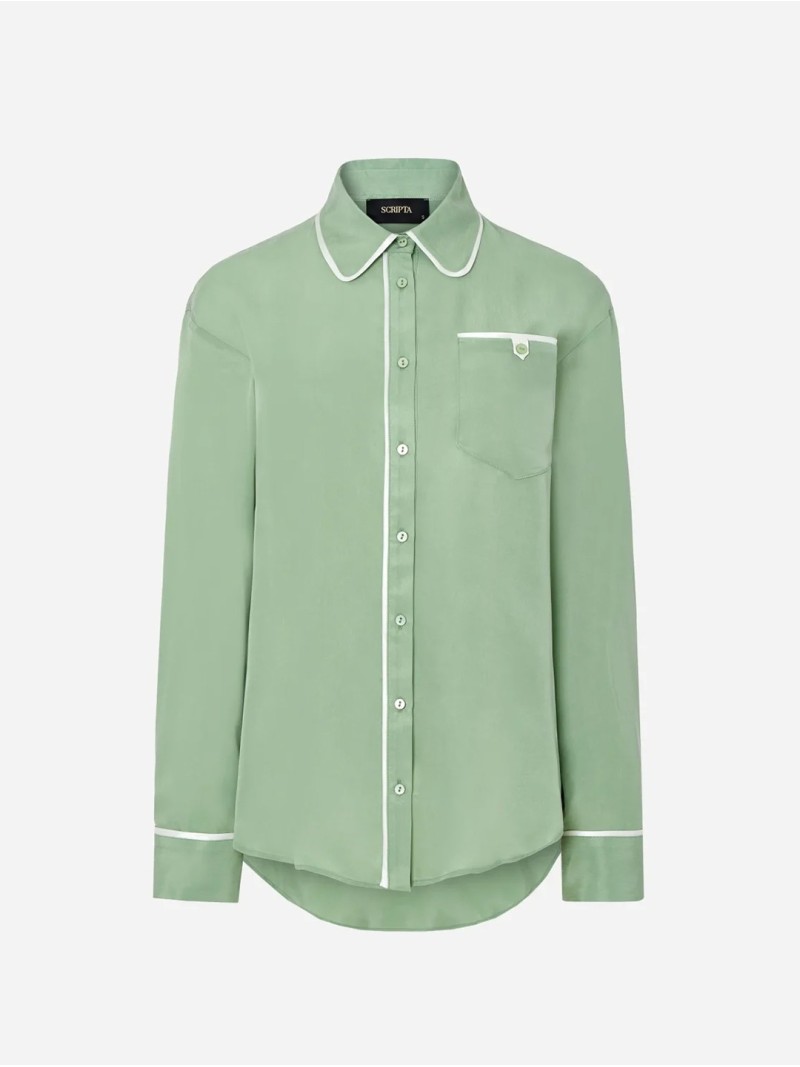 Plain blouse with contrasting fittings