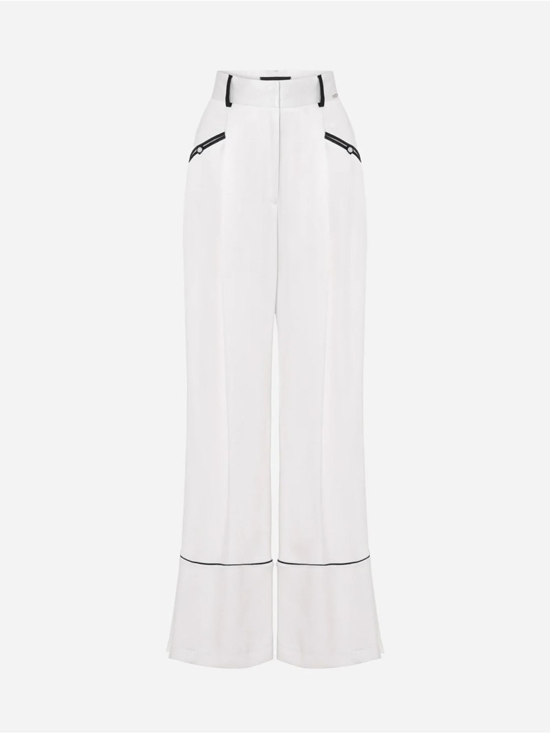 Calça lisa fluída com detallhe em contraste