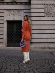 Midi dress with opening detail on the sleeves