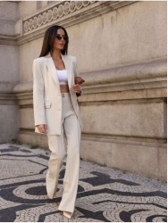 Blazer with custom metallic appliqué details