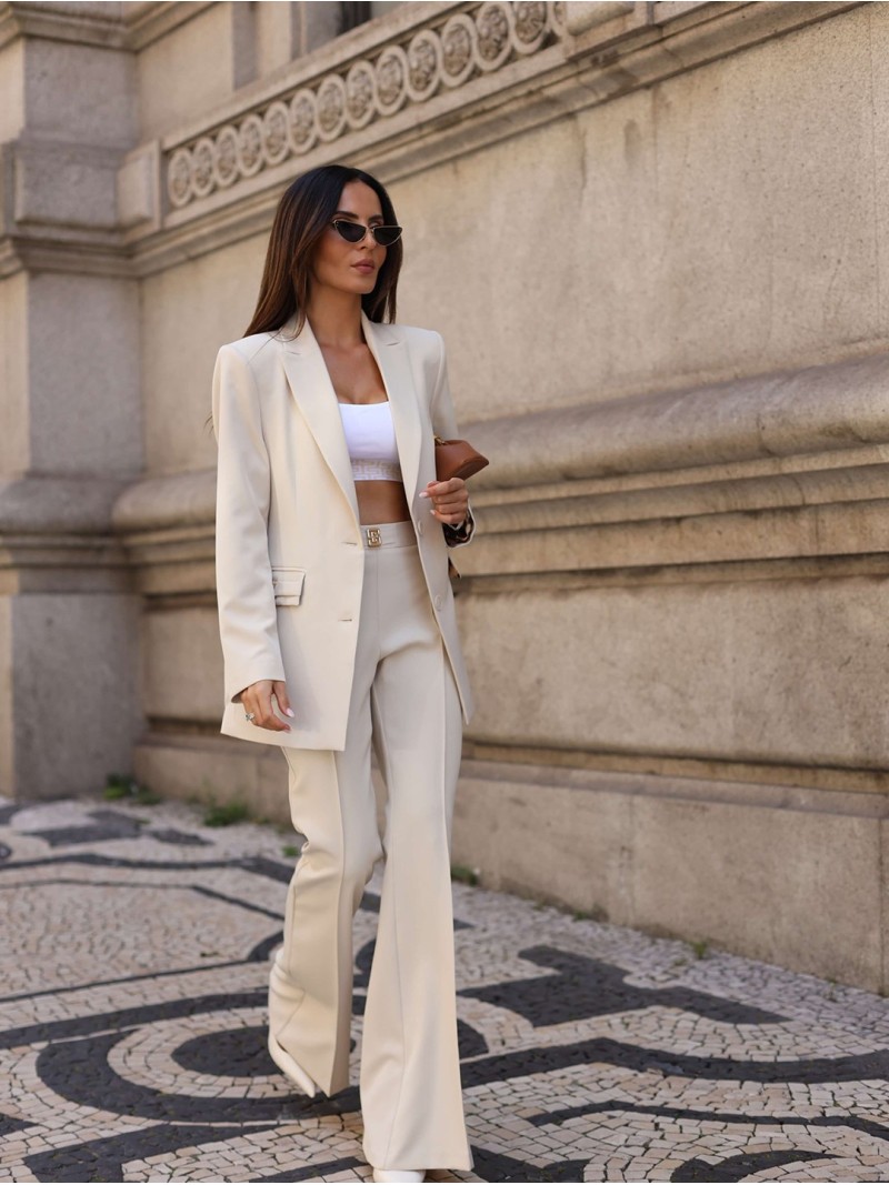 Flared trousers with metallic appliqué details