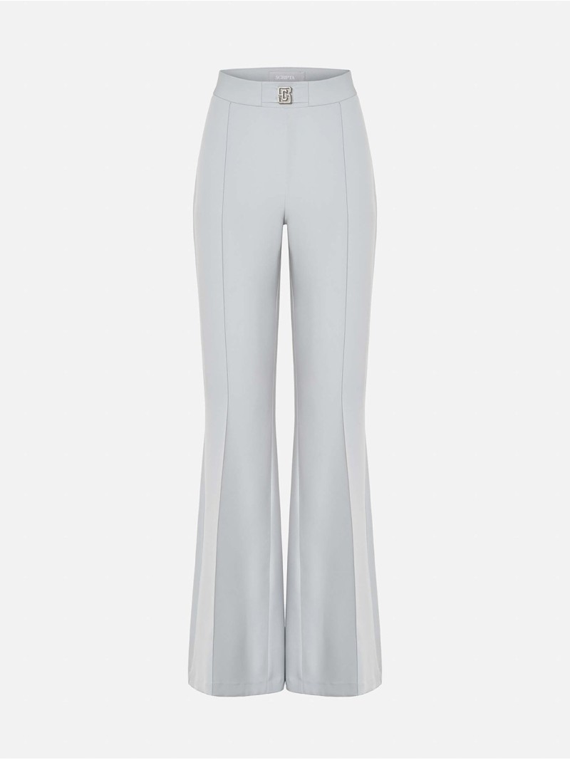 Flared trousers with metallic appliqué details