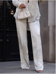 Fluid printed trousers with a straight cut