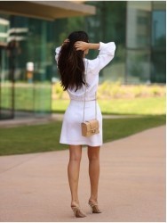 Blouse in crepe fabric with metallic snap button