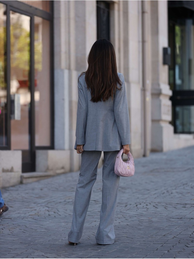 Long trousers in striped fabric