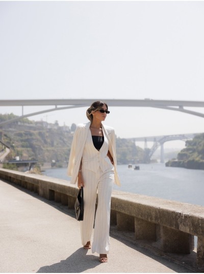 Long trousers in striped fabric