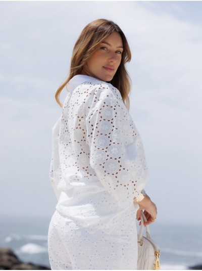Lace fabric trousers with a flared fit
