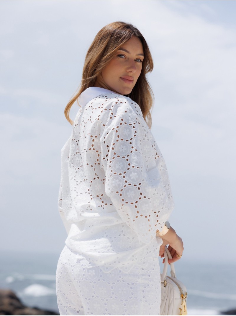 Lace fabric trousers with a flared fit