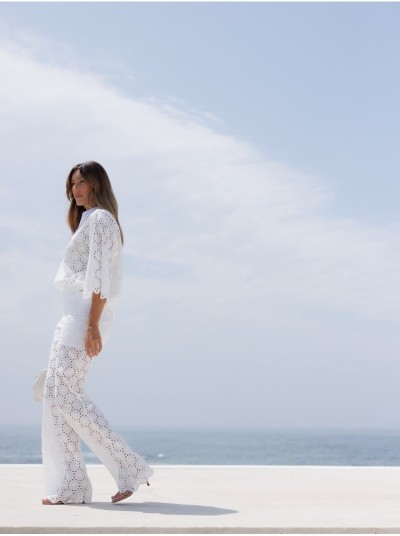 Lace fabric trousers with a flared fit
