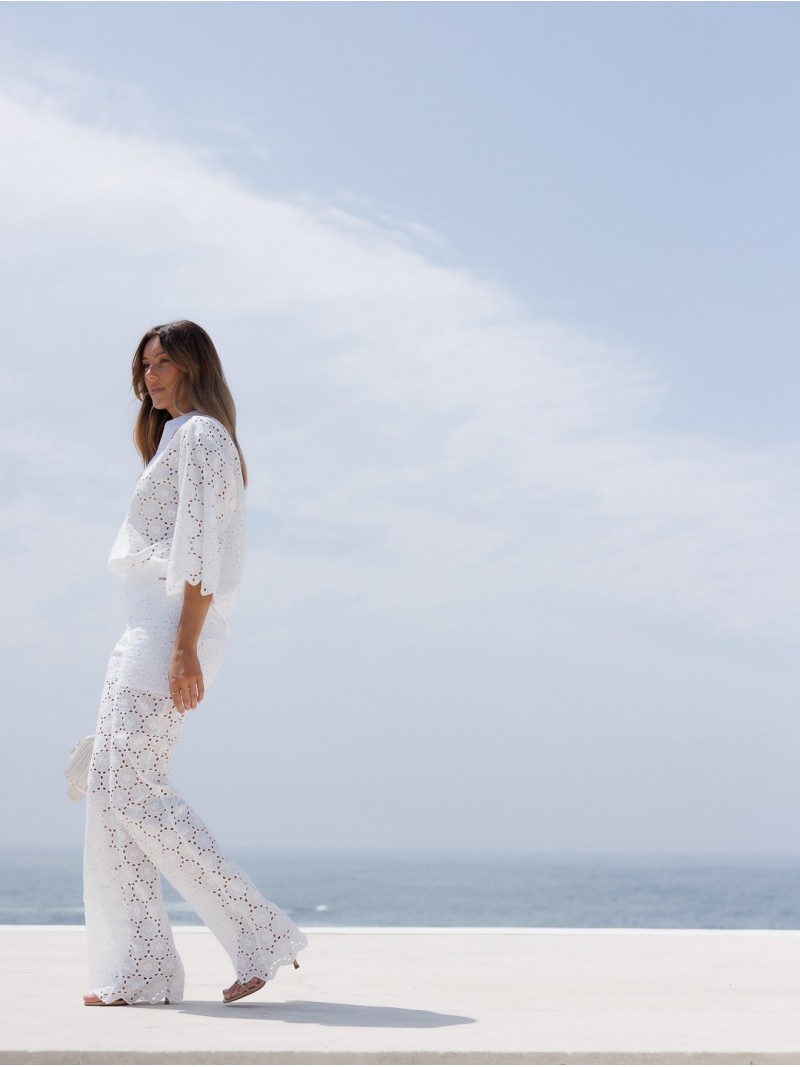 Lace fabric trousers with a flared fit