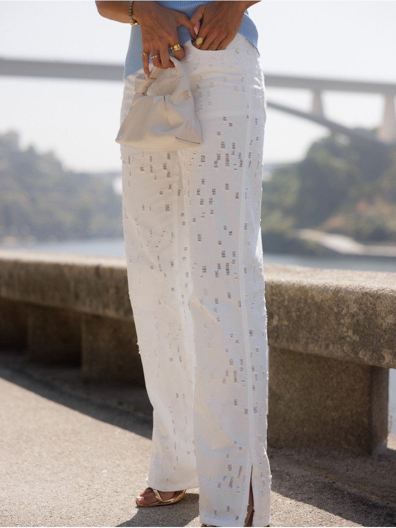 Jeans with a perforated effect