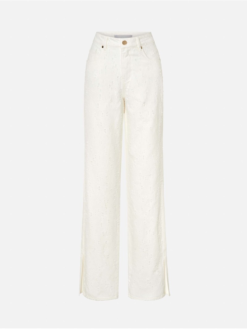 Jeans with a perforated effect