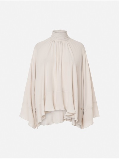 Blusa lisa fluída com folhos