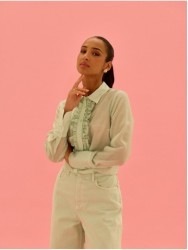 Blouse with ruffle at the front