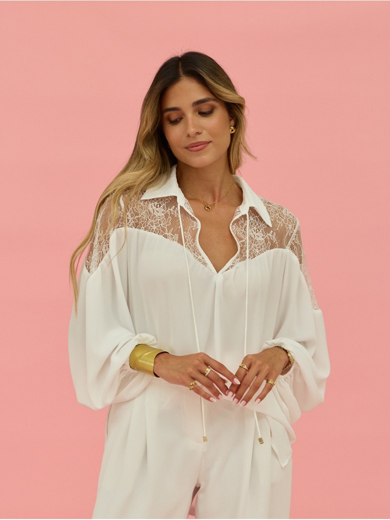Flowing blouse with lace appliqué