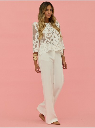 Flowing trousers with stitched crease