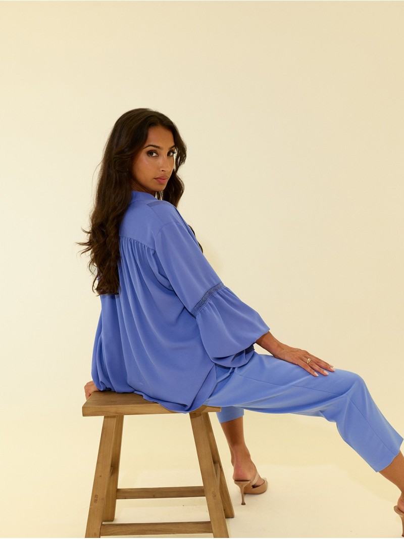 Fluid tunic with lace trim