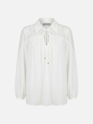 Flowing blouse with lace appliqué